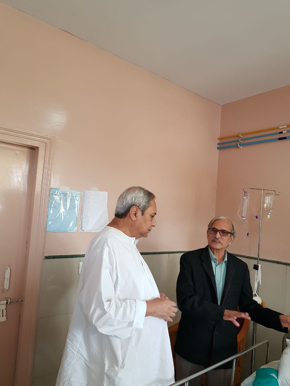 Chief Minister Naveen Patnaik with neurosurgeon Dr Ashok Mohapatra at AIIMS in New Delhi on Sunday