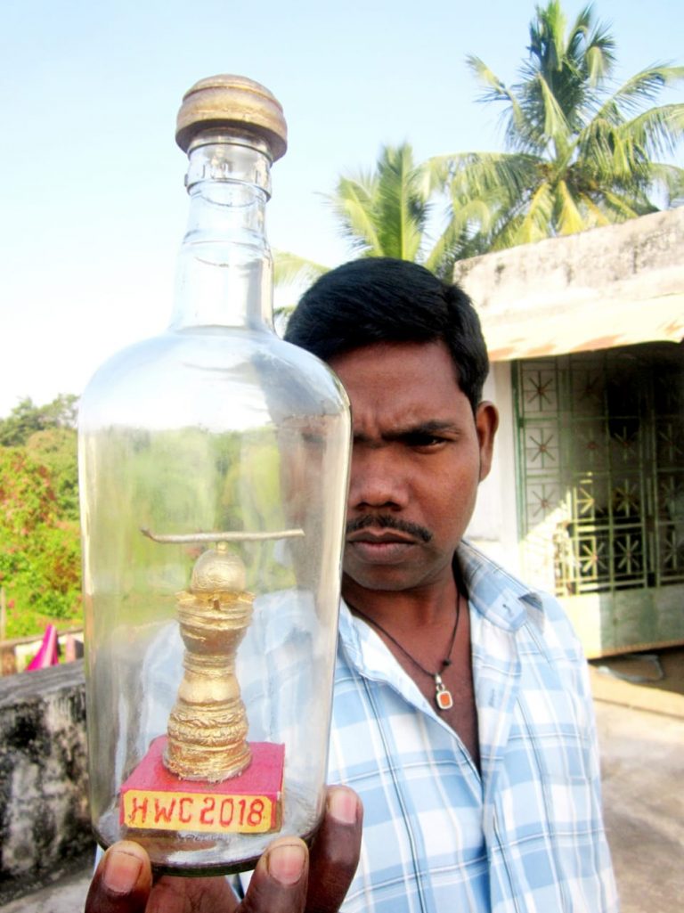 Miniature Sculpture Of Hockey World Cup Trophy In Bottle By Odisha Artist