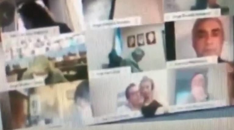politician kissing partner breast during virtual debate