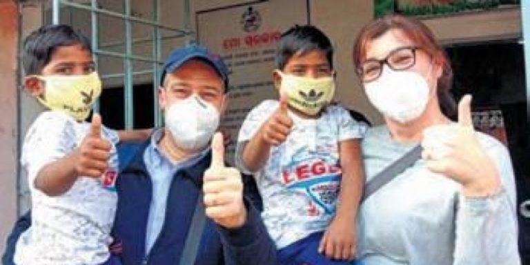 Twins adopted by Italian couple