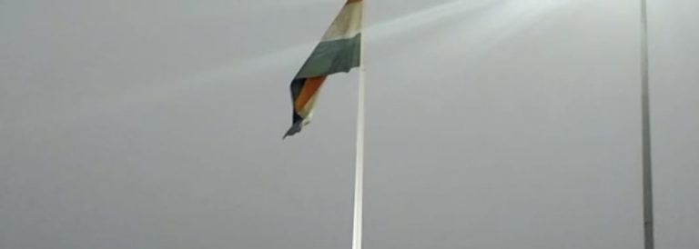 Discoloured flag at Puri railway station