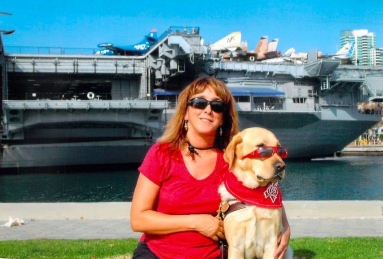 blind woman and her guide dog