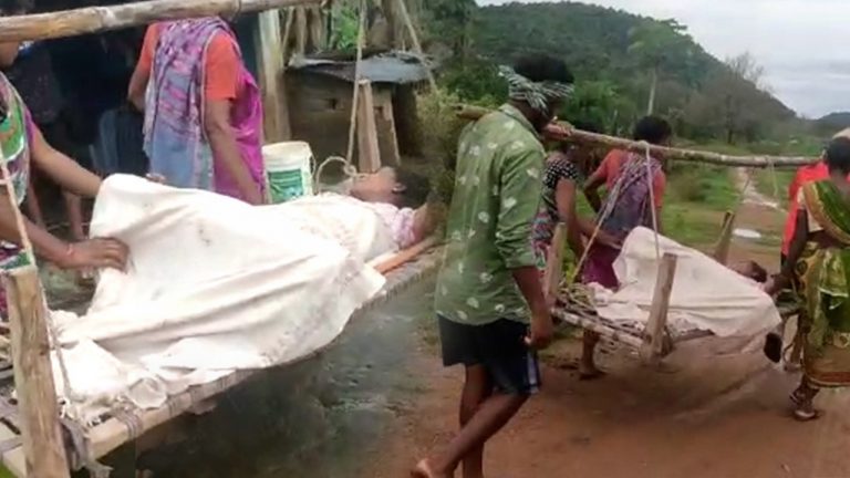 Woman Carried On Cot Delivers Baby On Way To Ambulance In Odisha’s Rayagada