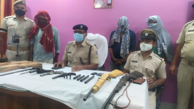 Guns seized during raid