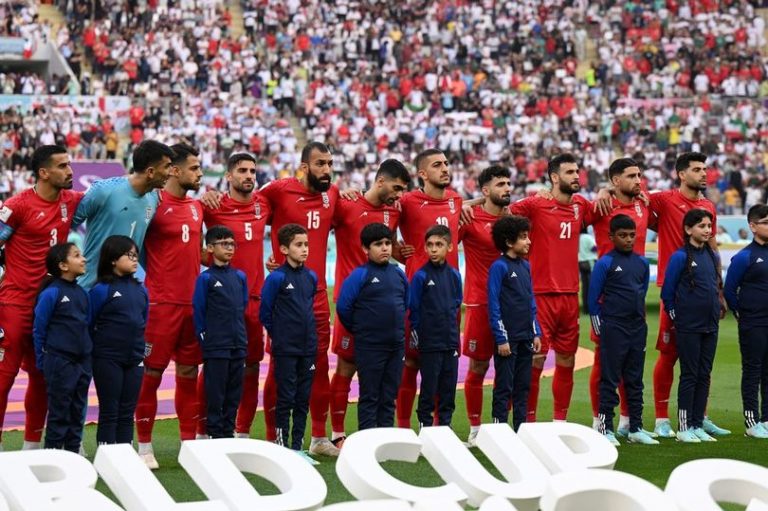 Iran team refuse to sing national anthem