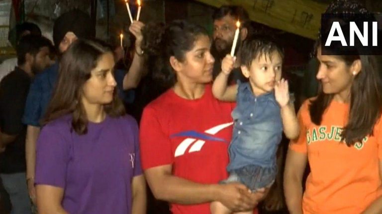 wrestlers candlelight march