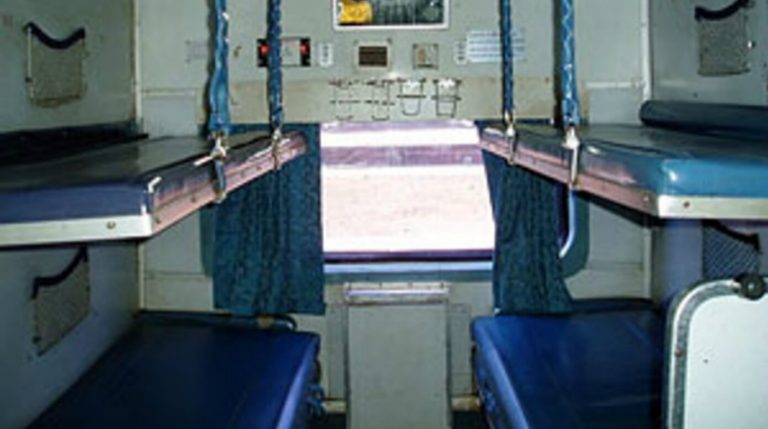upper berth falls on passenger