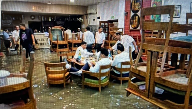 Viral Pic Of Journos Drinking In Flooded Delhi’s Press Club Prompts Hilarious Memes