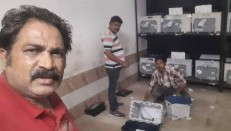 Odisha RMC Employee Suspended For Taking Selfie With EVMs