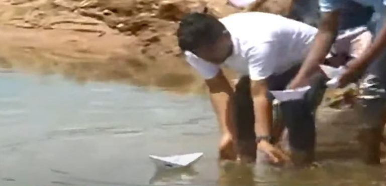 Job Aspirants Stage Protest In Cuttack By Making Paper Boats From Admit Cards & Floating In River