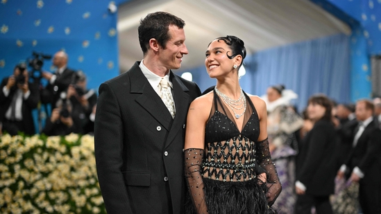 British-Albanian singer-songwriter Dua Lipa (R) and British actor Callum Turner arrive for the 2025 Met Gala at the Metropolitan Museum of Art on May 5, 2025, in New York. The Gala raises money for the Metropolitan Museum of Art's Costume Institute. The 2025 Met Gala is themed "Tailored for You," aligning with the Costume Institutes exhibition, "Superfine: Tailoring Black Style," set to open to the public on May 10. (Photo by ANGELA WEISS / AFP)