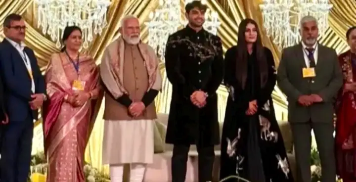 PM Modi Drops In At Neeraj Chopra’s Wedding Reception; Interacts With Family, Guests