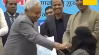 Nitish Kumar pulls down hijab