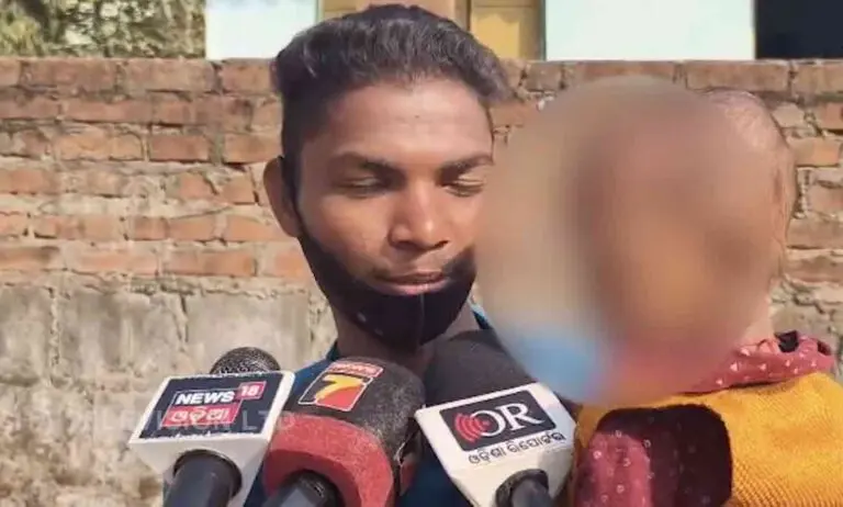 Tribal Man Cradles Baby Outside Exam Hall As Wife Fulfils Matric Dream In Odisha’s Koraput
