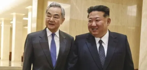 North Korea’s Kim Endorses Beijing’s Multipolar Push During Wang Visit