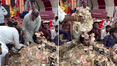 Singer buried under money
